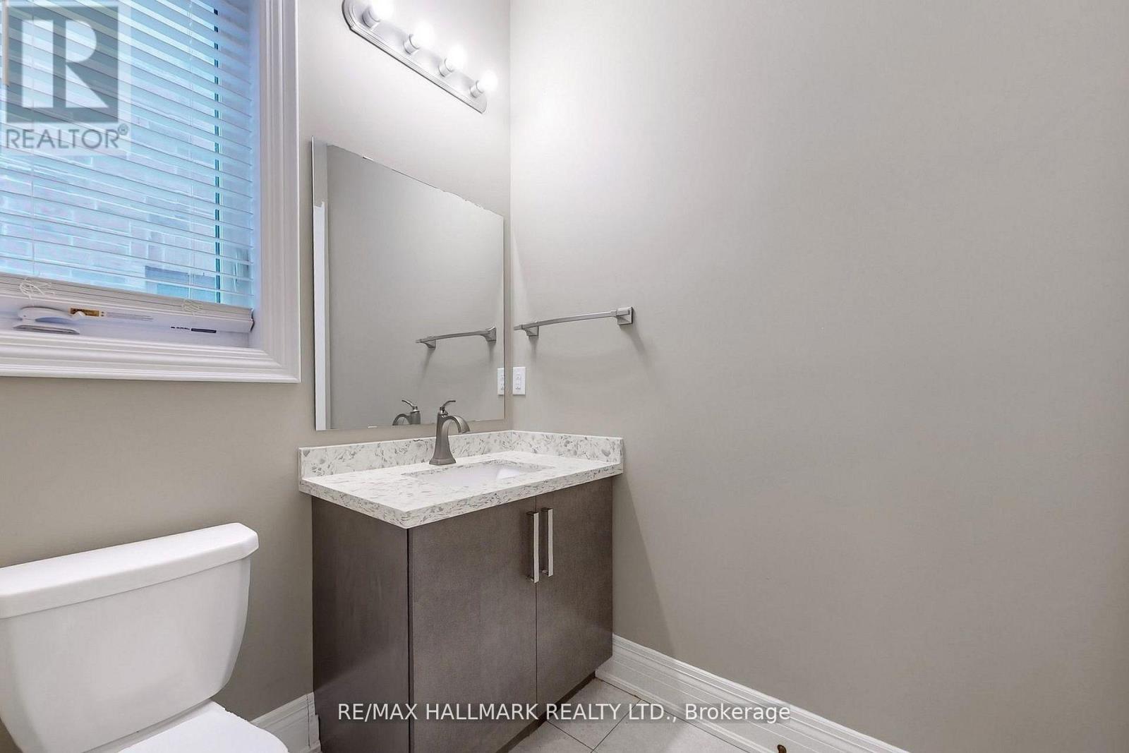 61 Mcisaac Drive, Springwater, ON - Indoor Photo Showing Bathroom
