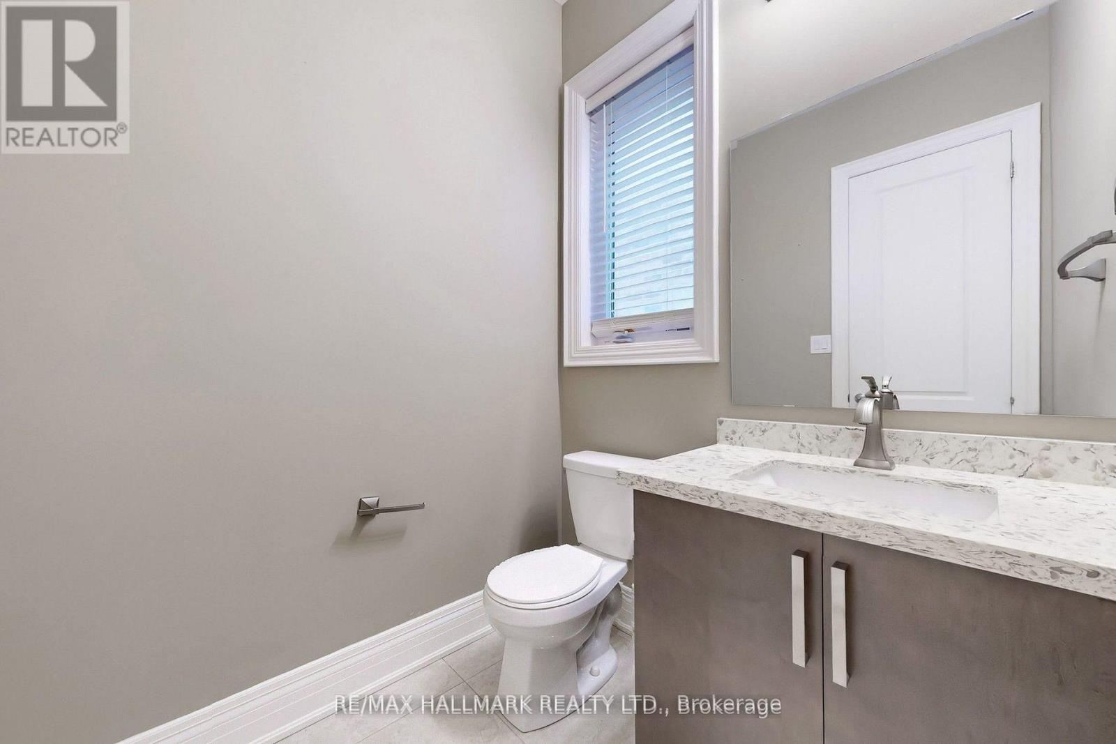 61 Mcisaac Drive, Springwater, ON - Indoor Photo Showing Bathroom