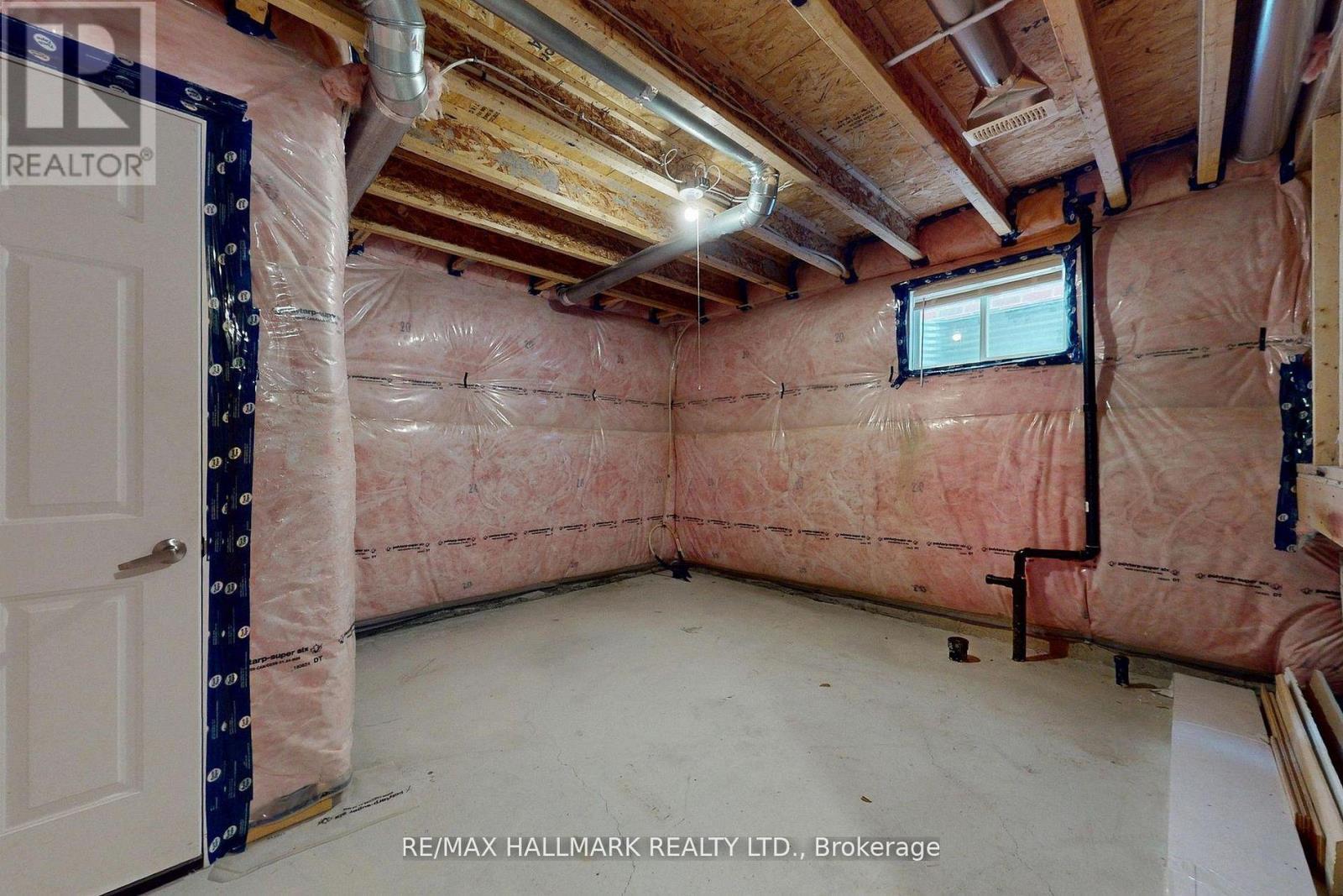 61 Mcisaac Drive, Springwater, ON - Indoor Photo Showing Basement
