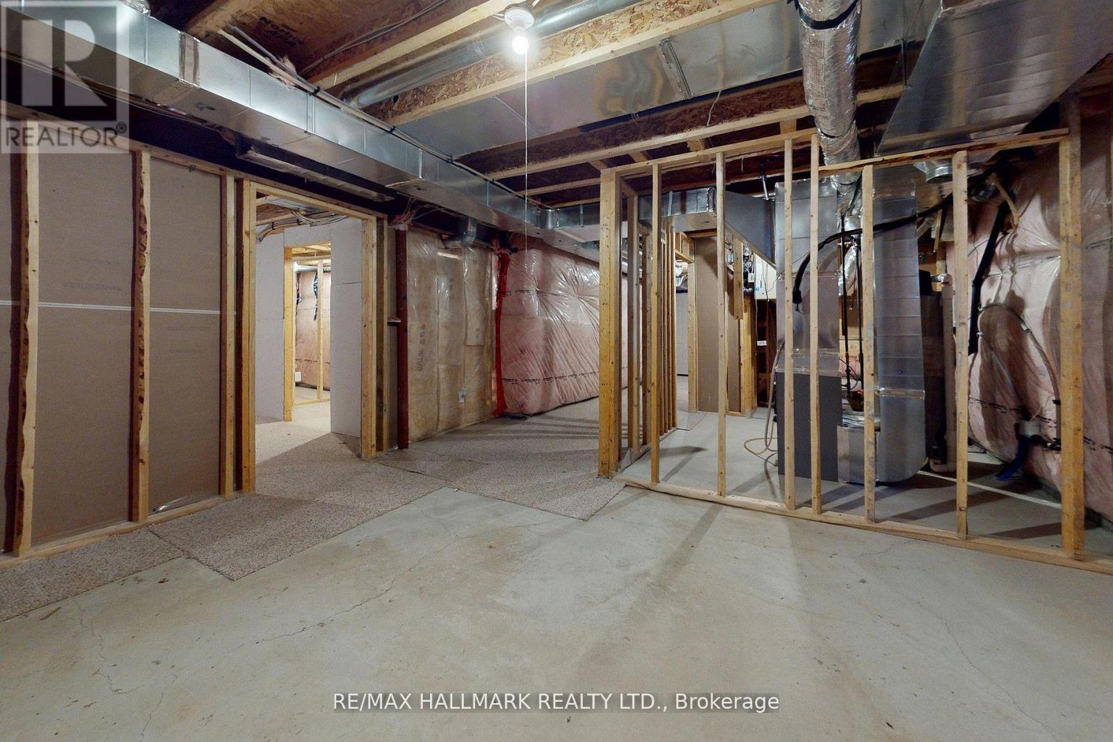61 Mcisaac Drive, Springwater, ON - Indoor Photo Showing Basement