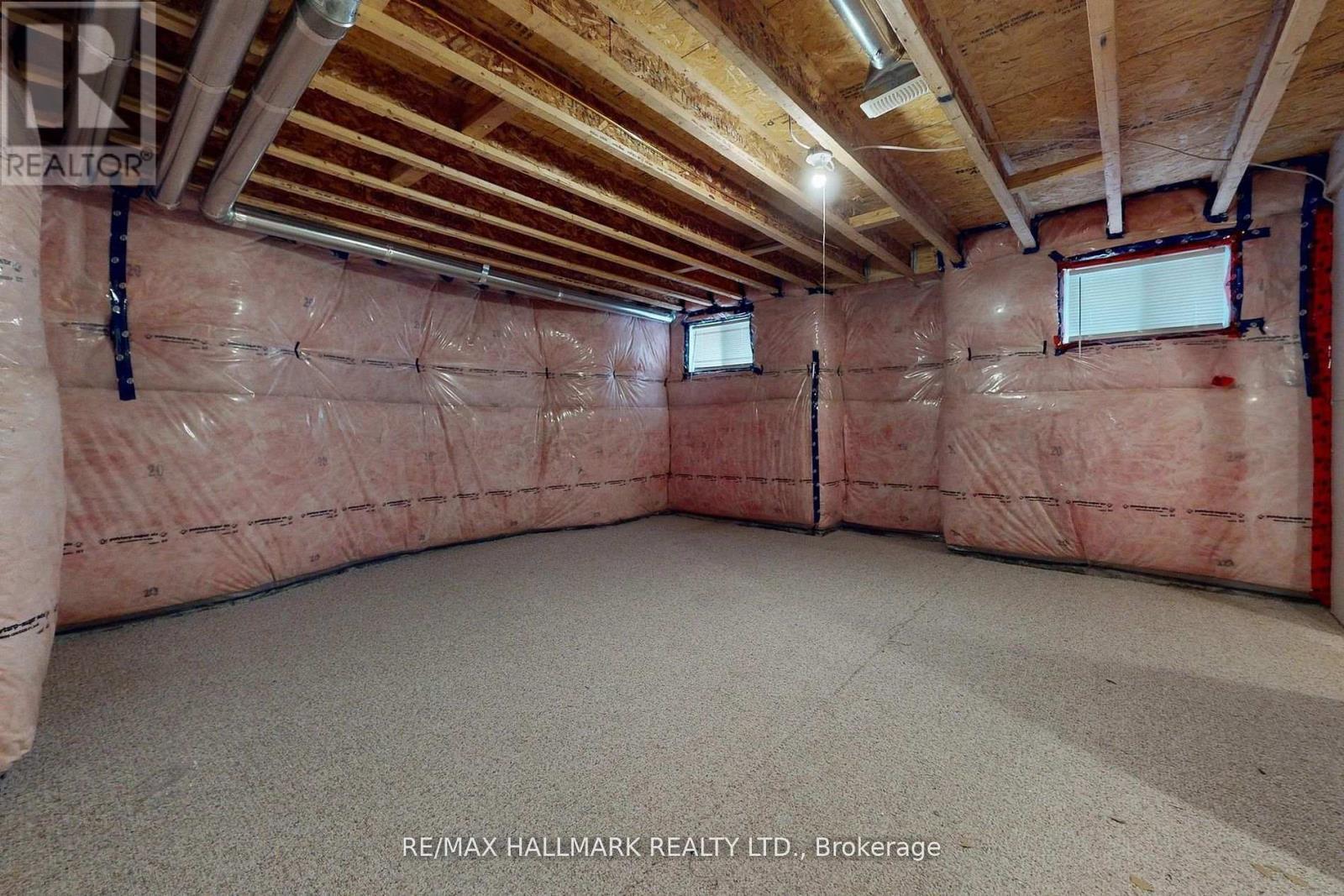 61 Mcisaac Drive, Springwater, ON - Indoor Photo Showing Basement