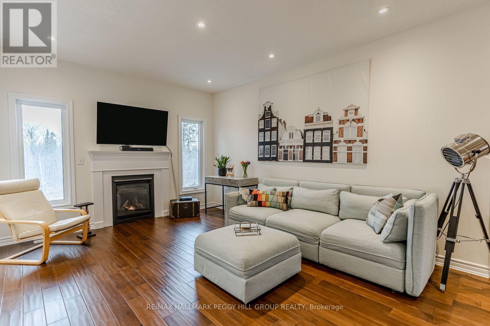 82 Diamond Valley Drive, Oro-Medonte, ON - Indoor Photo Showing Living Room With Fireplace