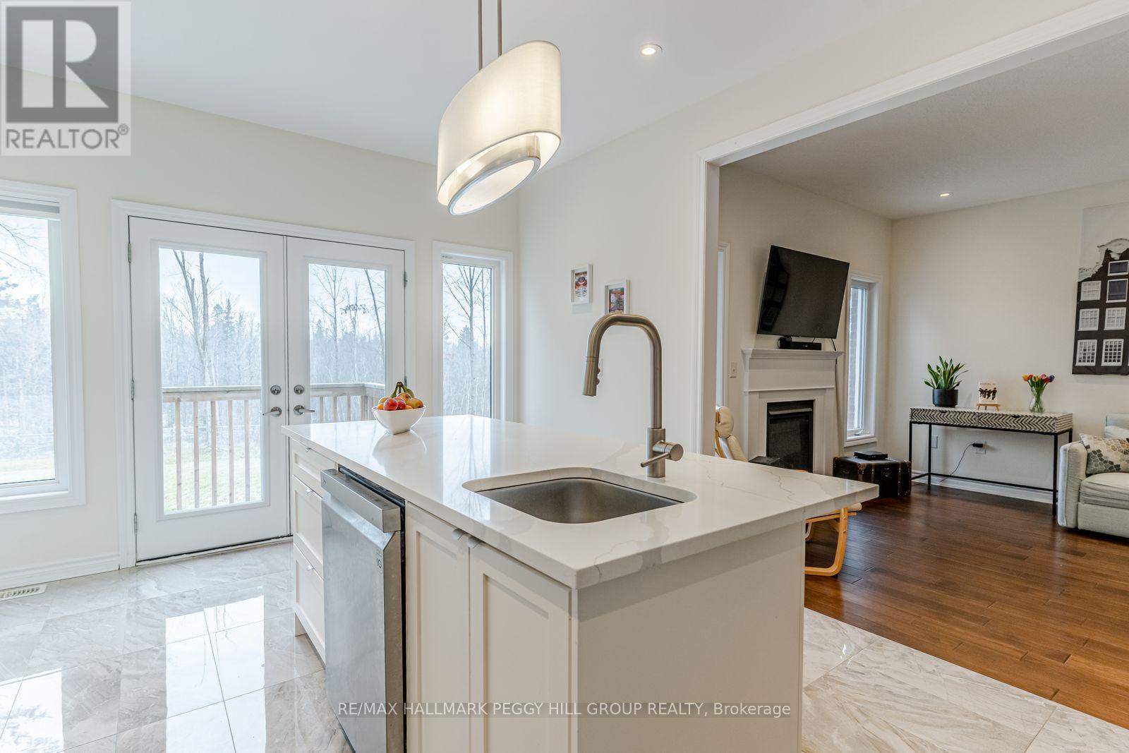82 Diamond Valley Drive, Oro-Medonte, ON - Indoor Photo Showing Kitchen With Fireplace