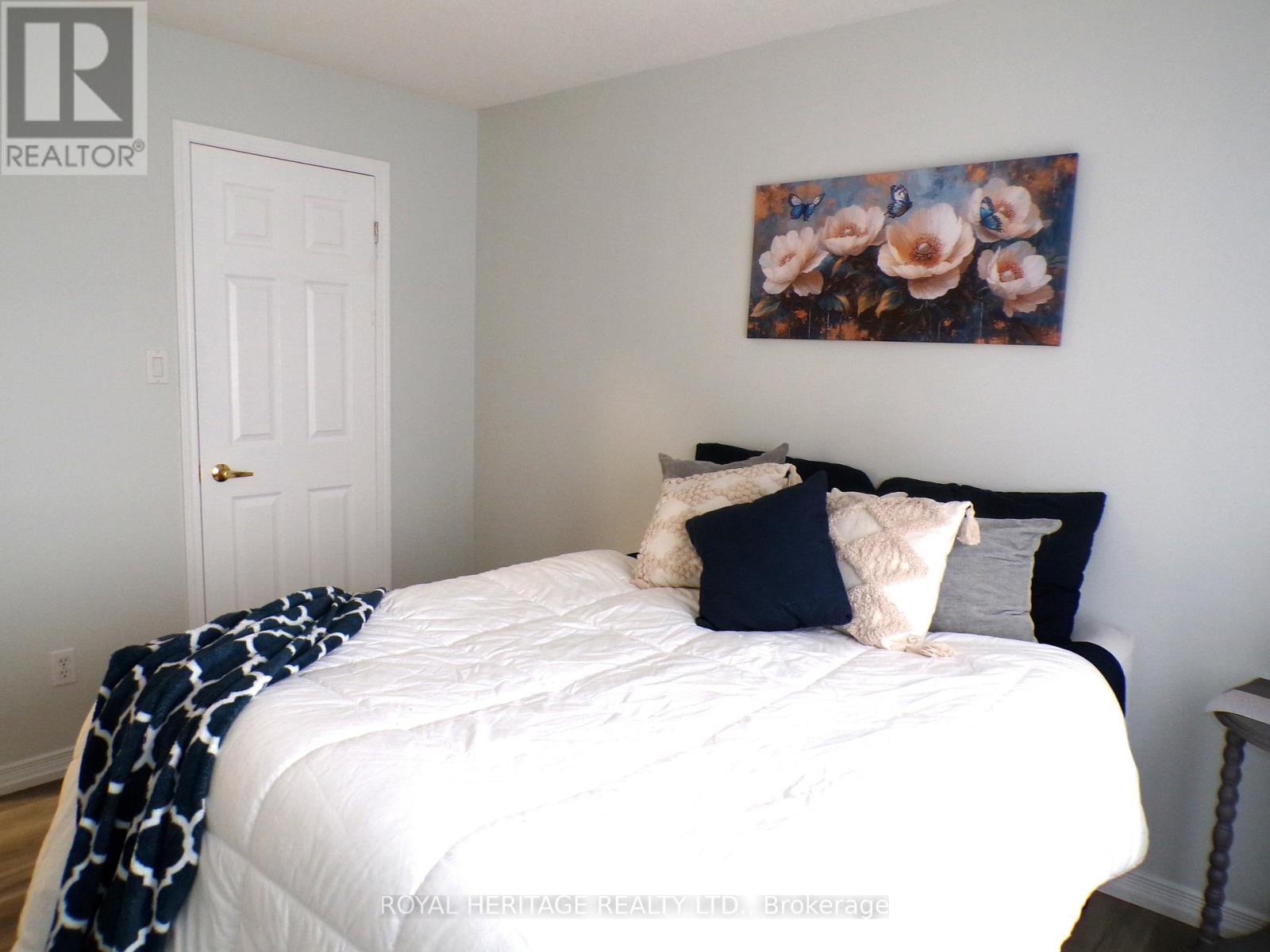 106 - 94 Aspen Springs Drive, Clarington (Bowmanville), ON - Indoor Photo Showing Bedroom
