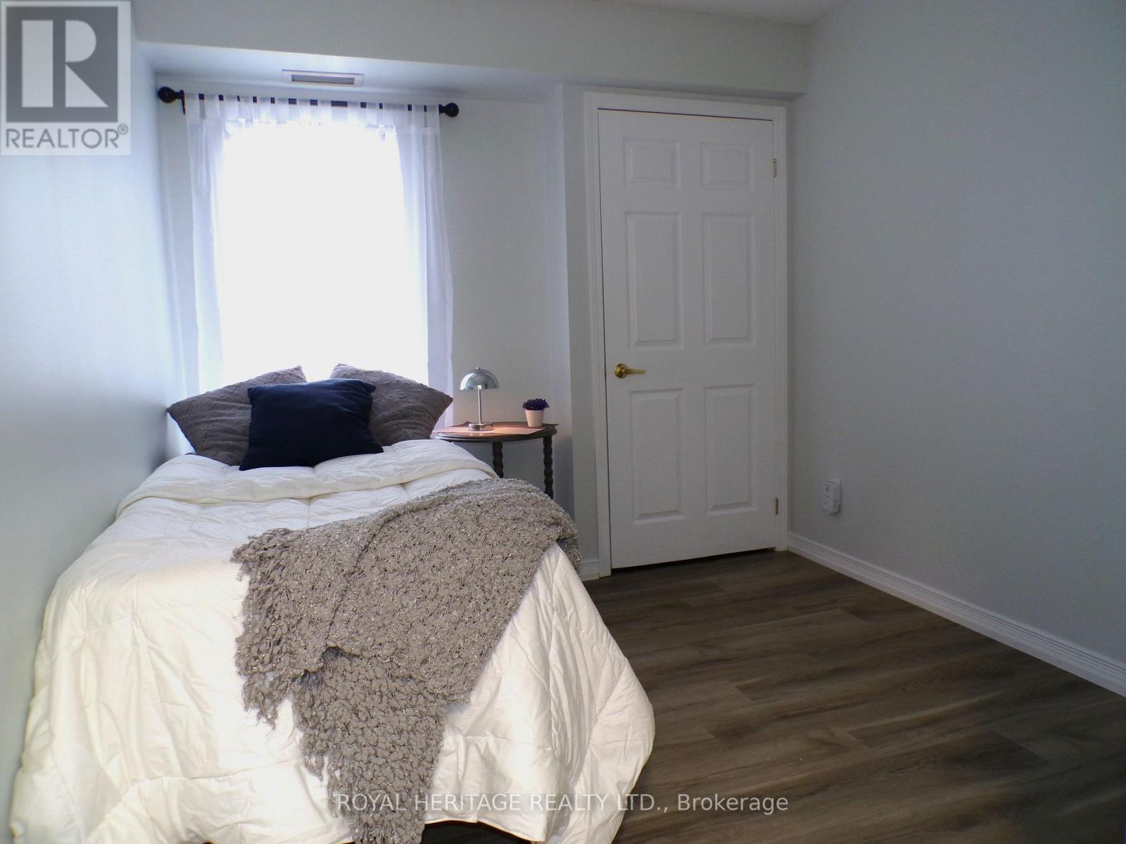 106 - 94 Aspen Springs Drive, Clarington (Bowmanville), ON - Indoor Photo Showing Bedroom
