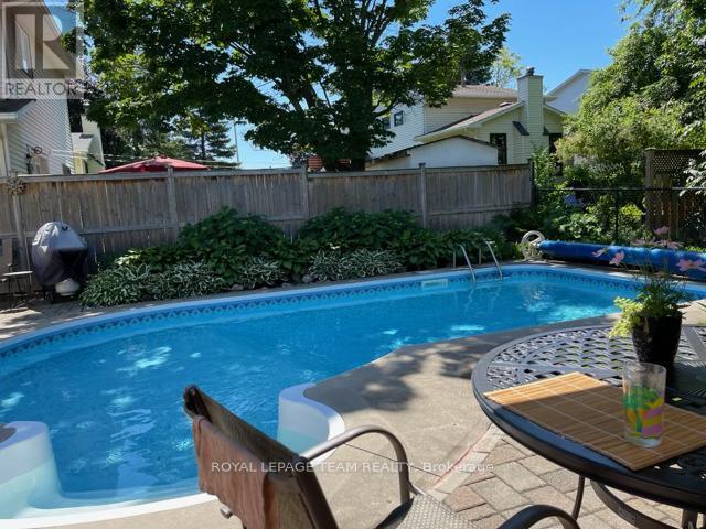 118 Seabrooke Drive, Ottawa, ON - Outdoor With In Ground Pool With Backyard