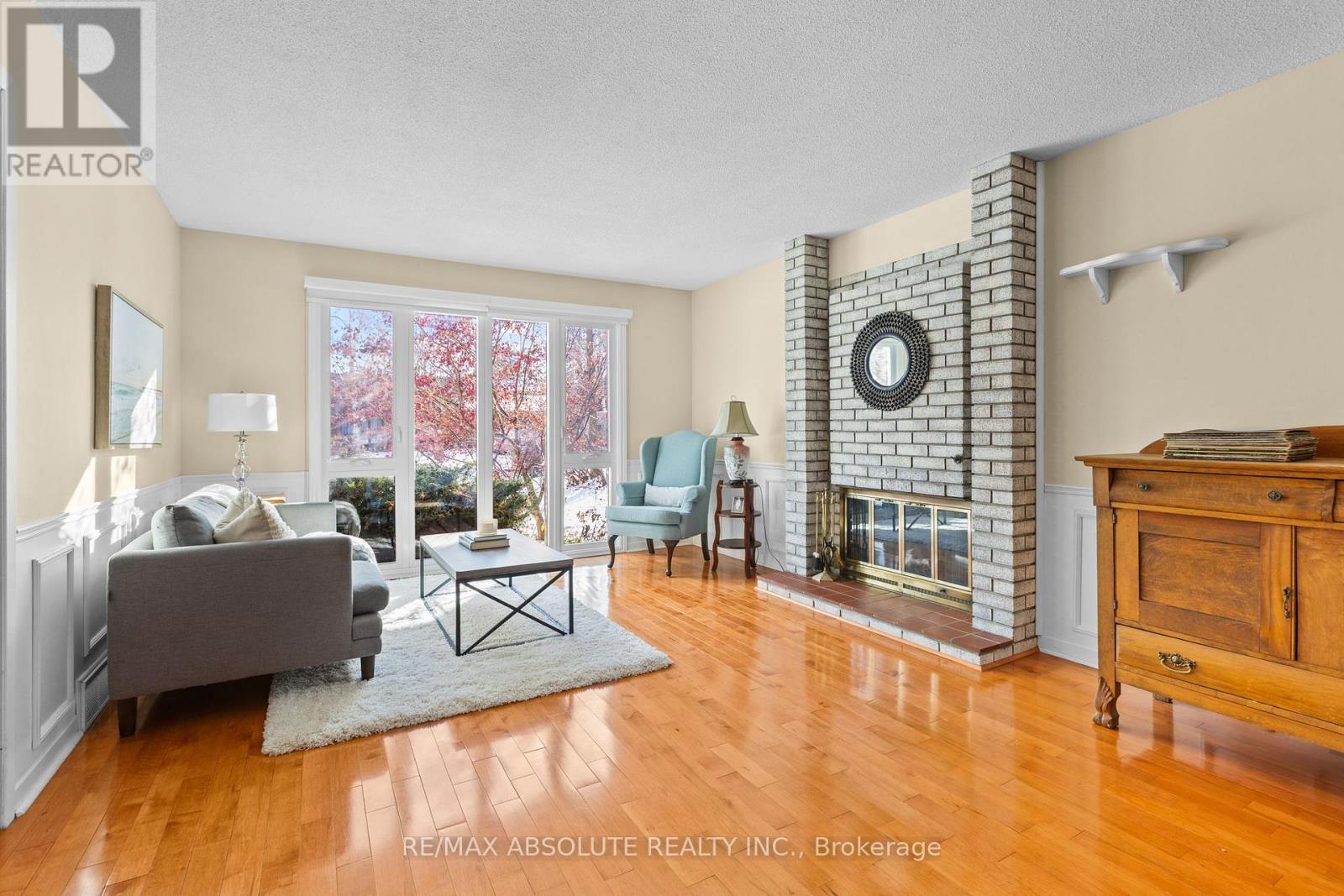 22 Banting Crescent, Ottawa, ON - Indoor Photo Showing Living Room With Fireplace