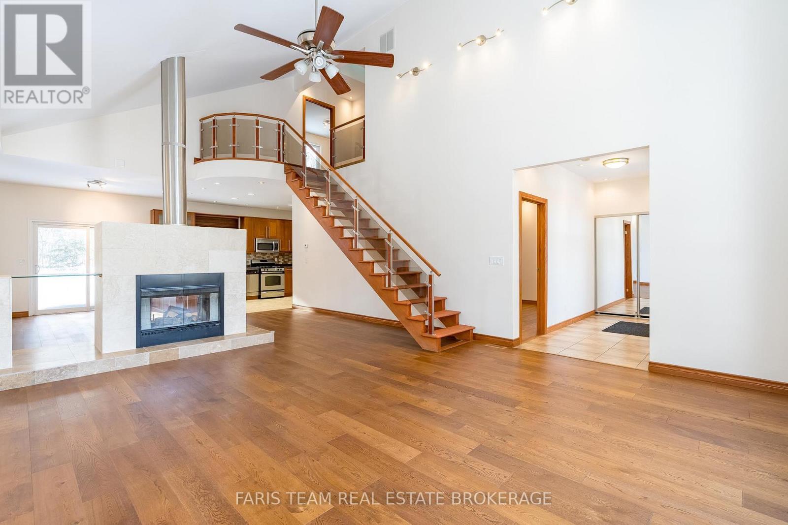 2384 Champlain Road, Tiny, ON - Indoor With Fireplace