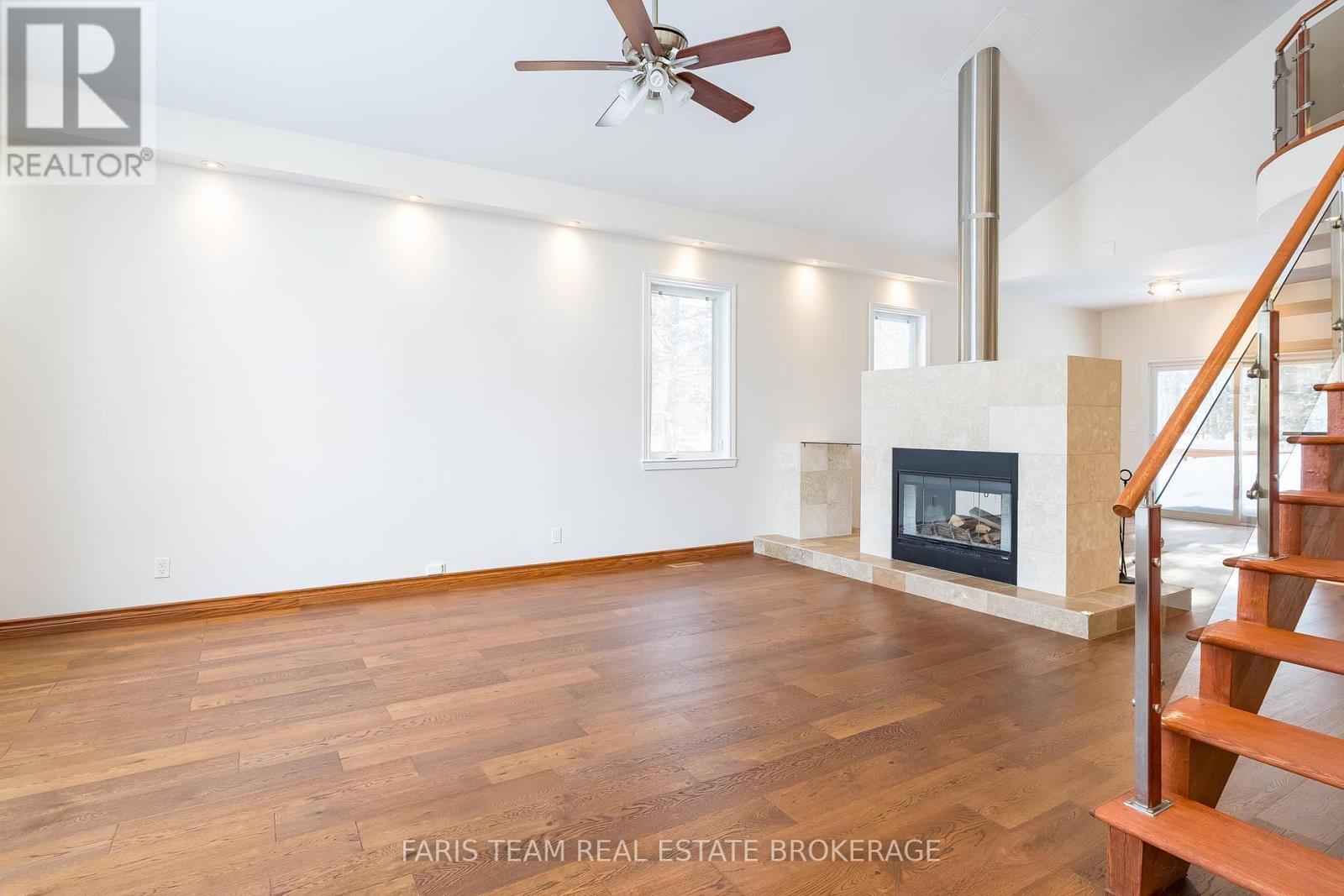 2384 Champlain Road, Tiny, ON - Indoor With Fireplace