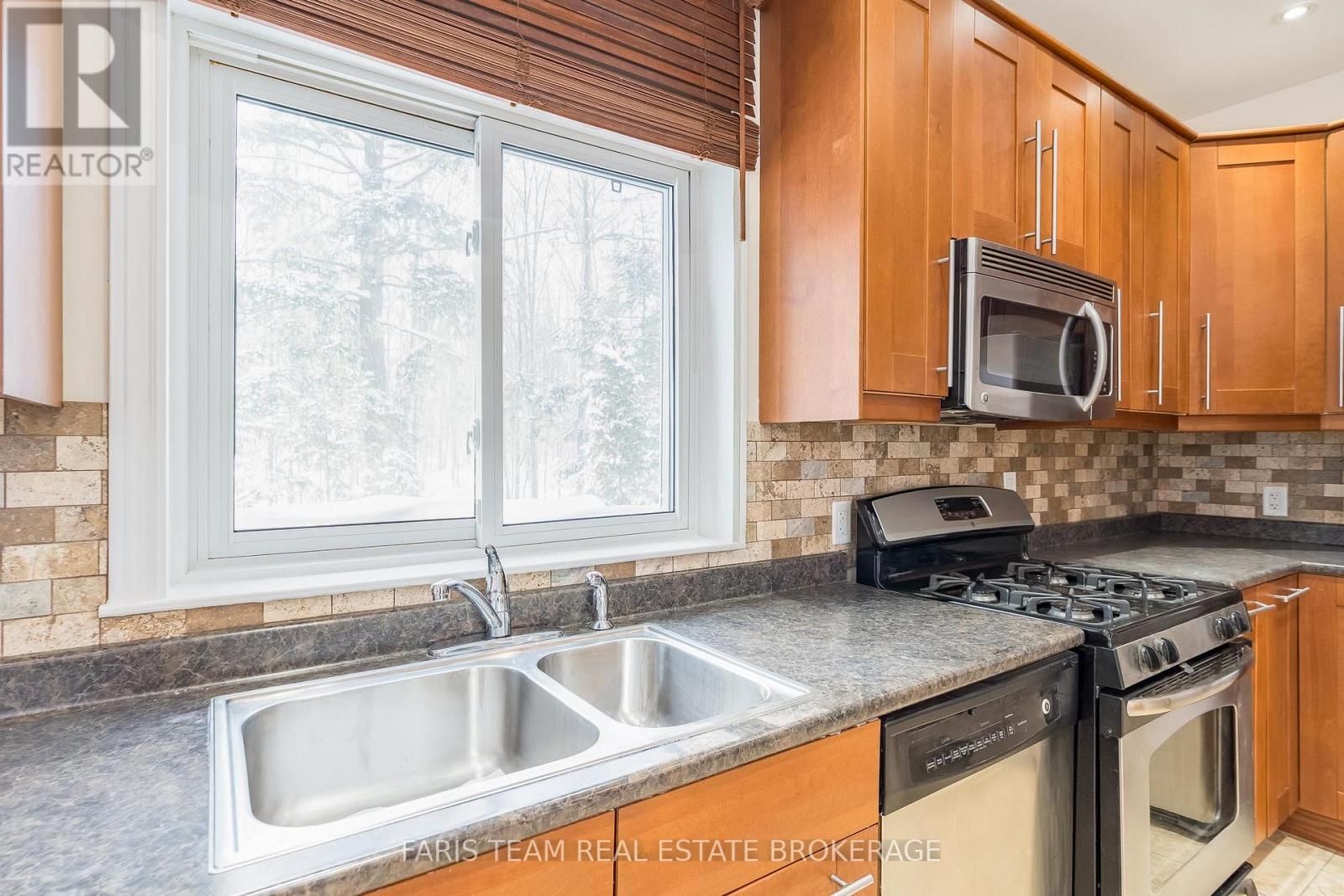 2384 Champlain Road, Tiny, ON - Indoor Photo Showing Kitchen With Double Sink
