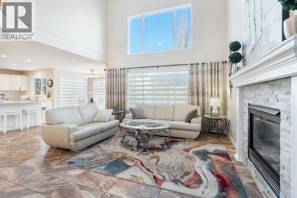 25 Cranwell Place Se, Calgary, AB - Indoor Photo Showing Living Room With Fireplace