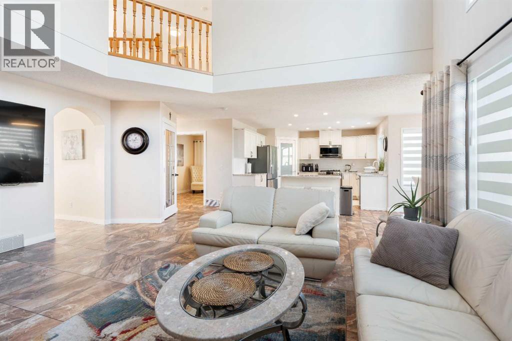 25 Cranwell Place Se, Calgary, AB - Indoor Photo Showing Living Room With Fireplace