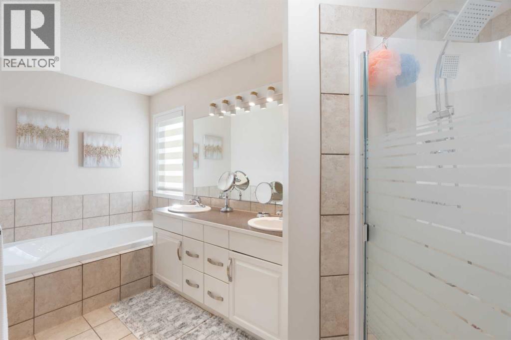 25 Cranwell Place Se, Calgary, AB - Indoor Photo Showing Bedroom