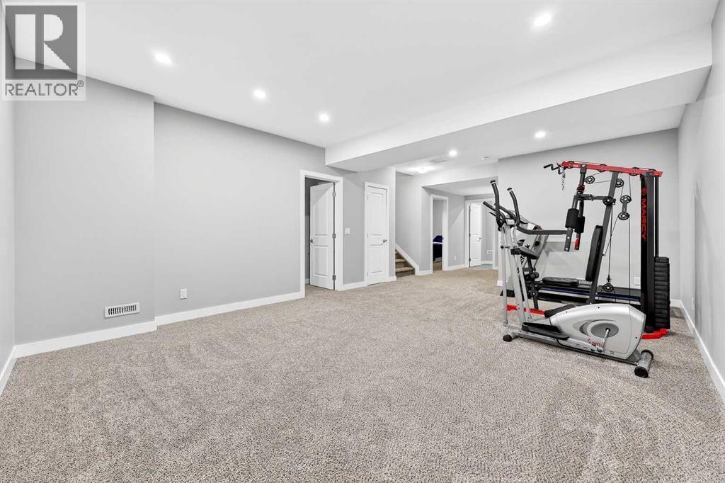 37 Evansfield Manor Nw, Calgary, AB - Indoor Photo Showing Gym Room