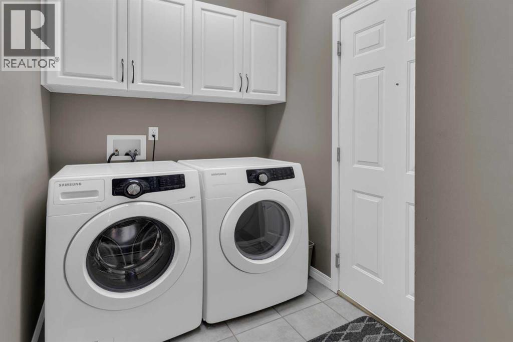 53 Scimitar Heath Nw, Calgary, AB - Indoor Photo Showing Laundry Room