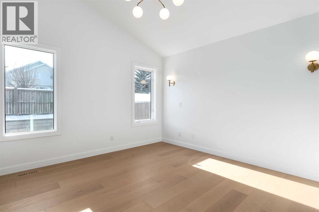 Primary Bedroom - 58 Edgevalley Close Nw, Calgary, AB - Indoor Photo Showing Other Room