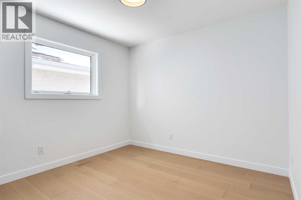 2nd Bedroom - 58 Edgevalley Close Nw, Calgary, AB - Indoor Photo Showing Other Room