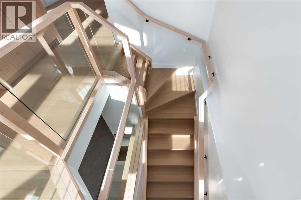 Staircase to Basement - 58 Edgevalley Close Nw, Calgary, AB - Indoor Photo Showing Other Room