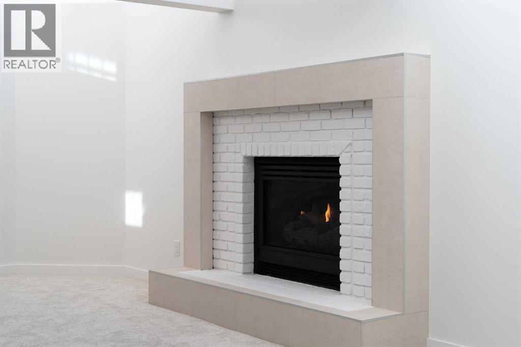 Gas Fireplace - 58 Edgevalley Close Nw, Calgary, AB - Indoor Photo Showing Living Room With Fireplace