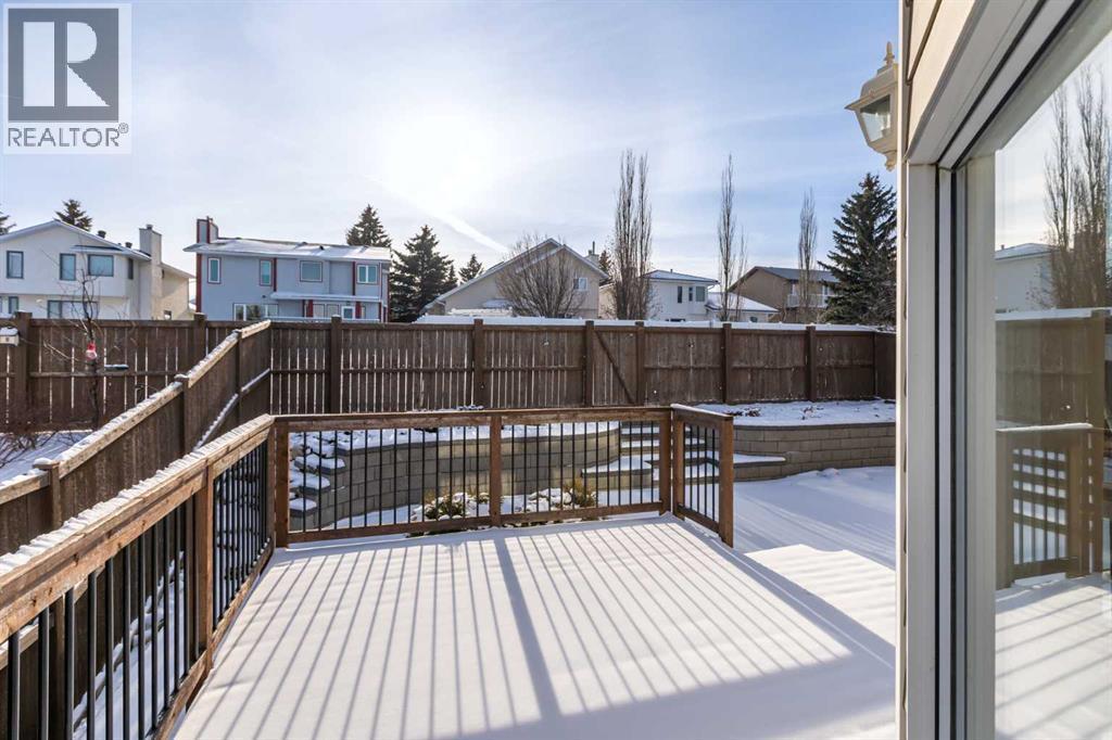 Backyard Deck - 58 Edgevalley Close Nw, Calgary, AB - Outdoor With Exterior
