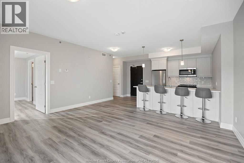 728 Brownstone Drive Unit# 201, Tecumseh, ON - Indoor Photo Showing Kitchen With Upgraded Kitchen