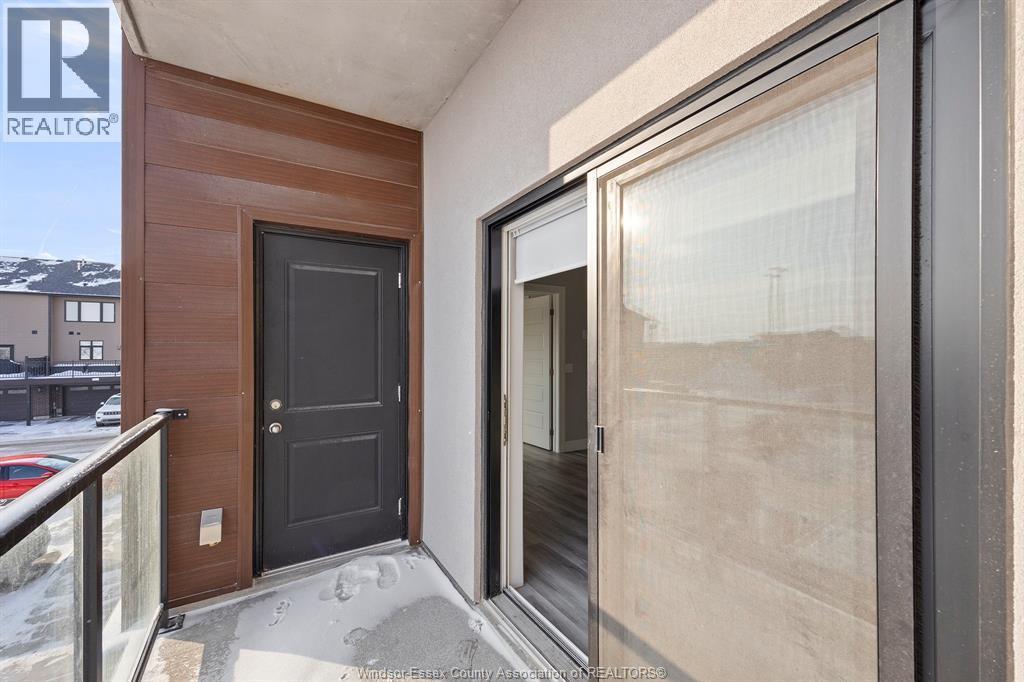 728 Brownstone Drive Unit# 201, Tecumseh, ON - Outdoor With Balcony With Exterior