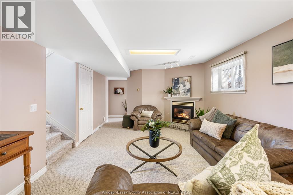 70 Middleton Line, Wheatley, ON - Indoor Photo Showing Living Room With Fireplace