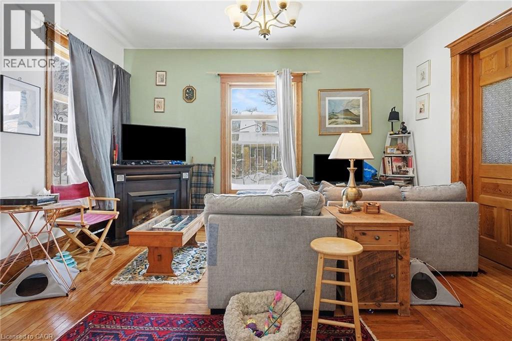 1316 E King Street E, Hamilton, ON - Indoor Photo Showing Living Room With Fireplace