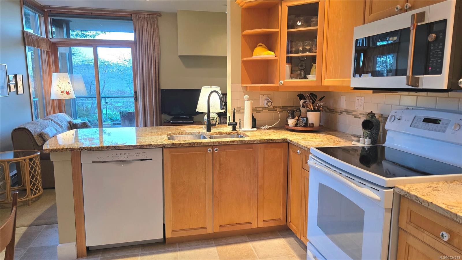 108-5329 Cordova Bay Rd, Saanich, BC - Indoor Photo Showing Kitchen With Double Sink