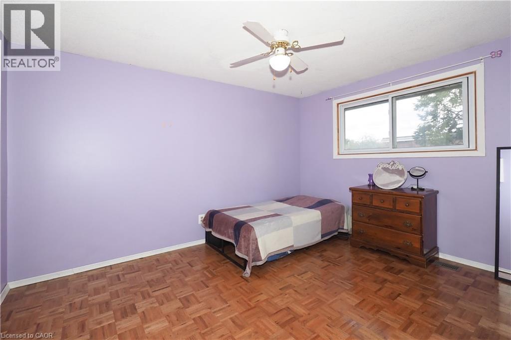 Bedroom with ceiling fan and parquet flooring - 10 Balfour Crescent, Kitchener, ON - Indoor Photo Showing Bedroom