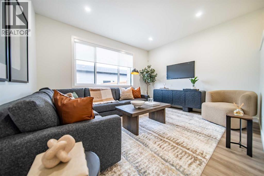 1149 Sailfin Heath, Rural Rocky View County, AB - Indoor Photo Showing Living Room