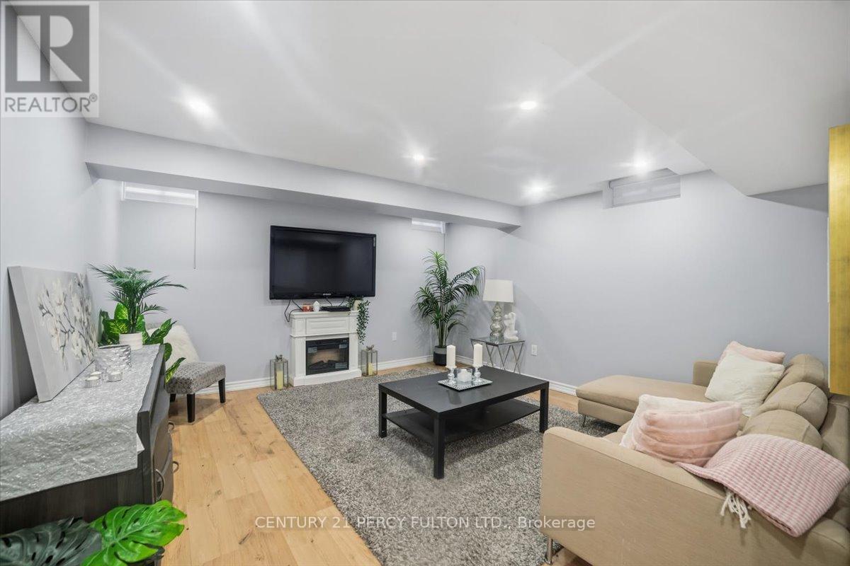 67 Kenilworth Cres - Basement - 67 Kenilworth Crescent, Whitby, ON - Indoor With Fireplace