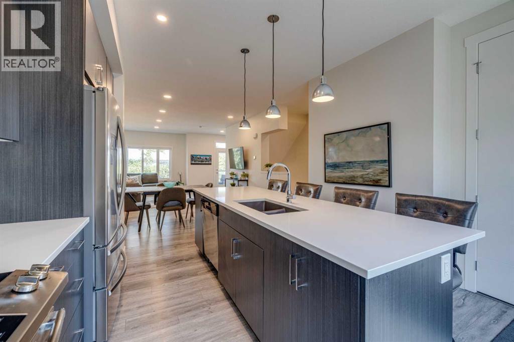 614 Greenbriar Common Nw, Calgary, AB - Indoor Photo Showing Kitchen With Double Sink With Upgraded Kitchen