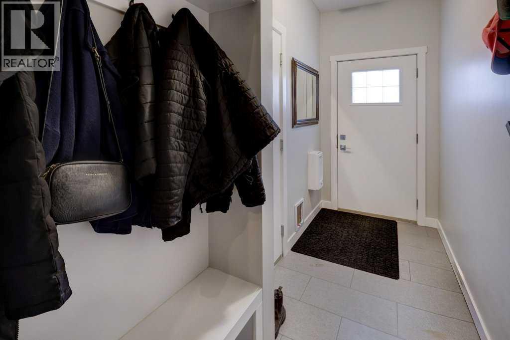 703, 115 Sagewood Drive Sw, Airdrie, AB - Indoor Photo Showing Other Room