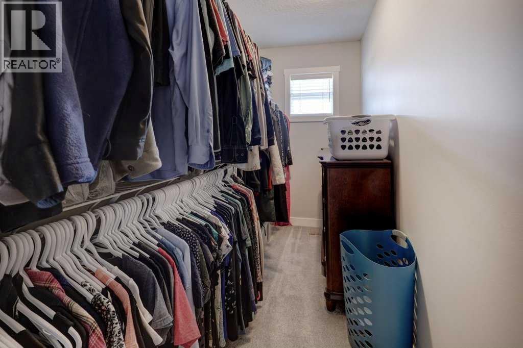 703, 115 Sagewood Drive Sw, Airdrie, AB - Indoor With Storage