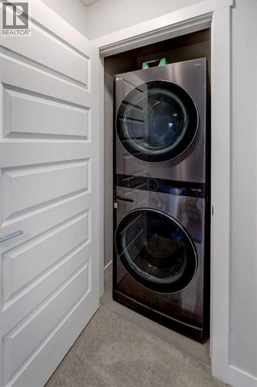703, 115 Sagewood Drive Sw, Airdrie, AB - Indoor Photo Showing Laundry Room