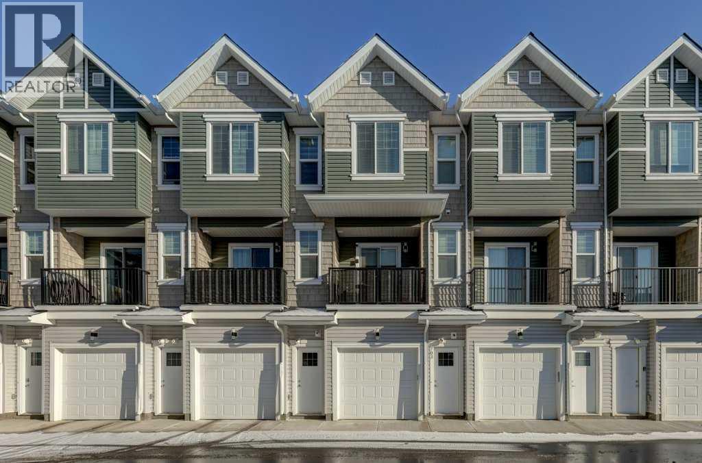 703, 115 Sagewood Drive Sw, Airdrie, AB - Outdoor With Balcony With Facade