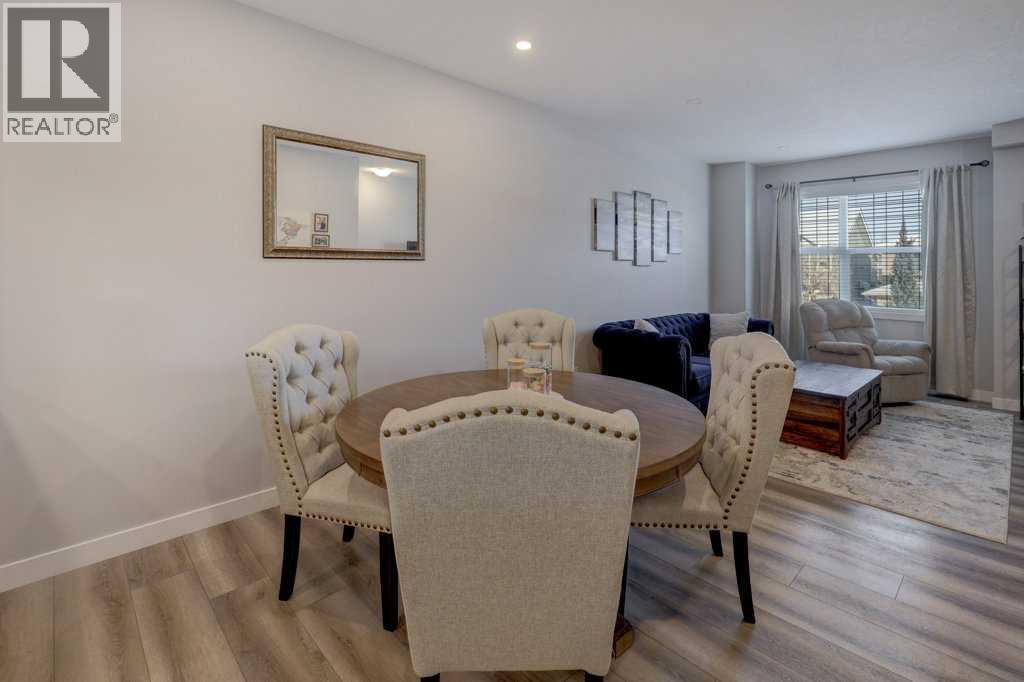 703, 115 Sagewood Drive Sw, Airdrie, AB - Indoor Photo Showing Dining Room