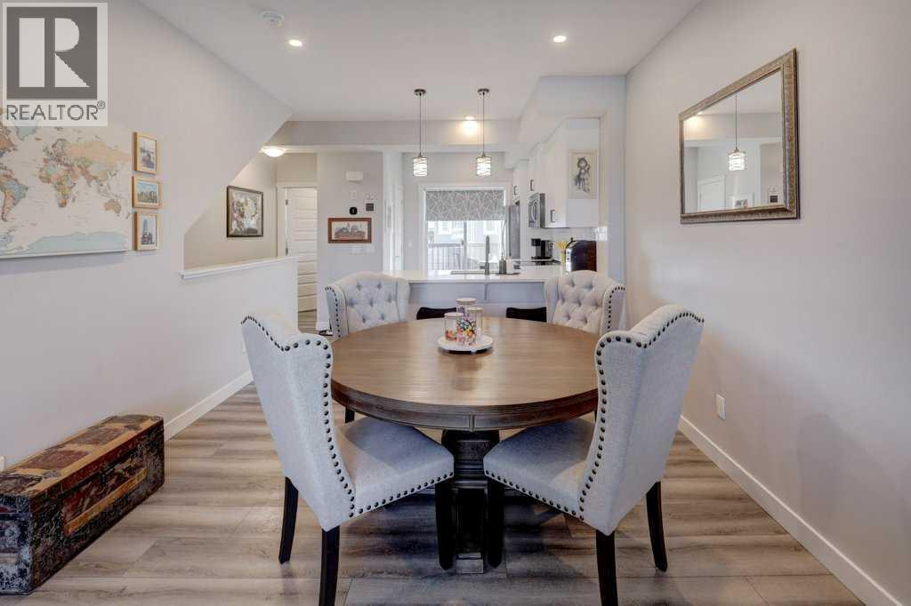 703, 115 Sagewood Drive Sw, Airdrie, AB - Indoor Photo Showing Dining Room
