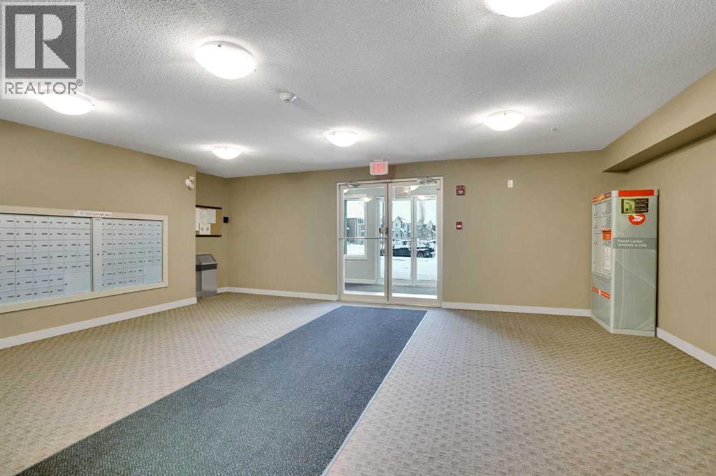 411, 15 Saddlestone Way Ne, Calgary, AB - Indoor Photo Showing Other Room