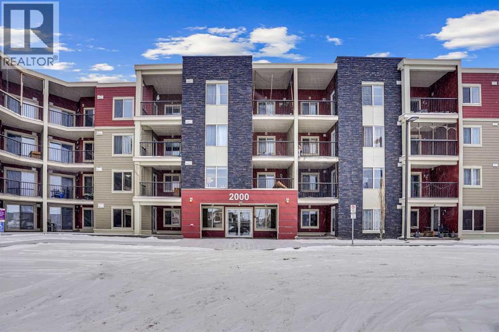 411, 15 Saddlestone Way Ne, Calgary, AB - Outdoor With Balcony With Facade