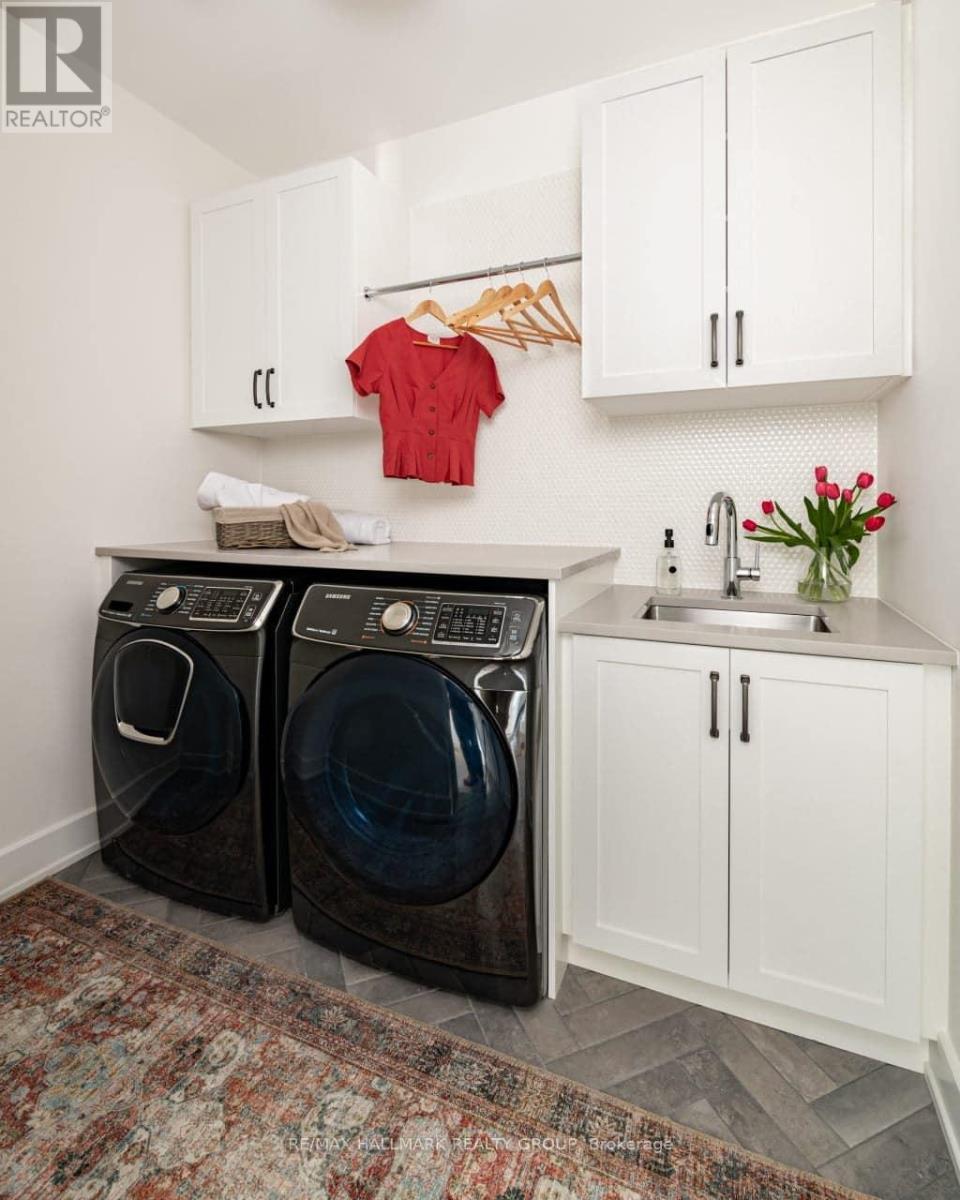 Images are to showcase builder finishes only. - 611 Persimmon Way, Ottawa, ON - Indoor Photo Showing Laundry Room
