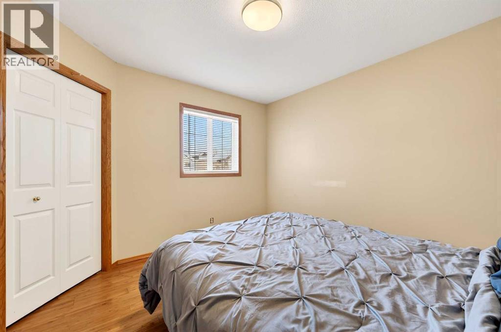 30 Tuscarora Way Nw, Calgary, AB - Indoor Photo Showing Bedroom