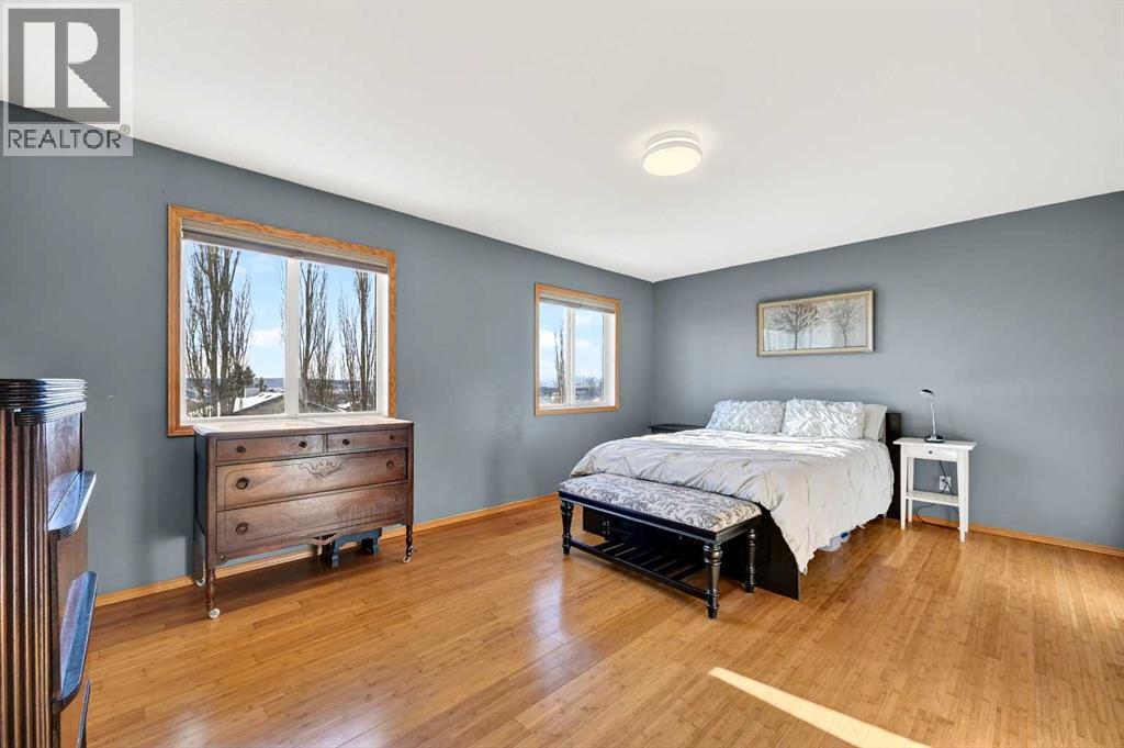 30 Tuscarora Way Nw, Calgary, AB - Indoor Photo Showing Bedroom