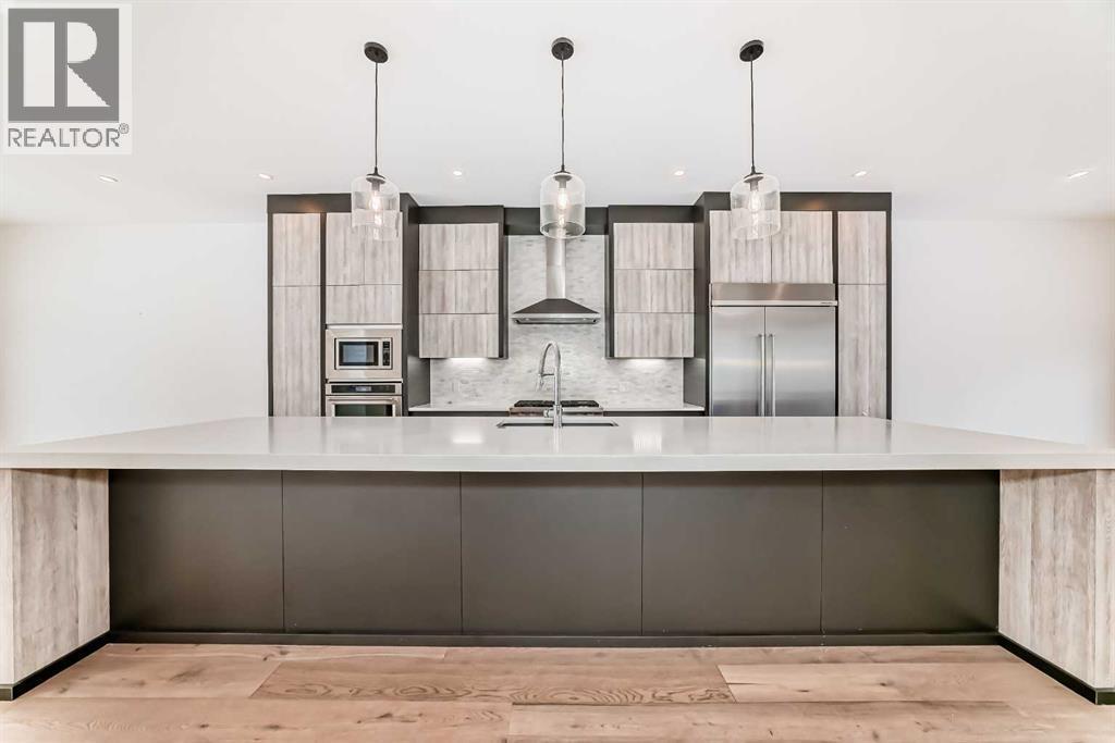 923 36A Street Nw, Calgary, AB - Indoor Photo Showing Kitchen With Upgraded Kitchen