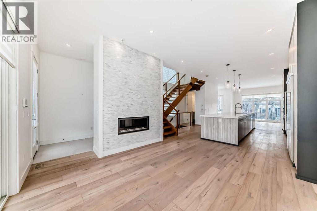 923 36A Street Nw, Calgary, AB - Indoor With Fireplace