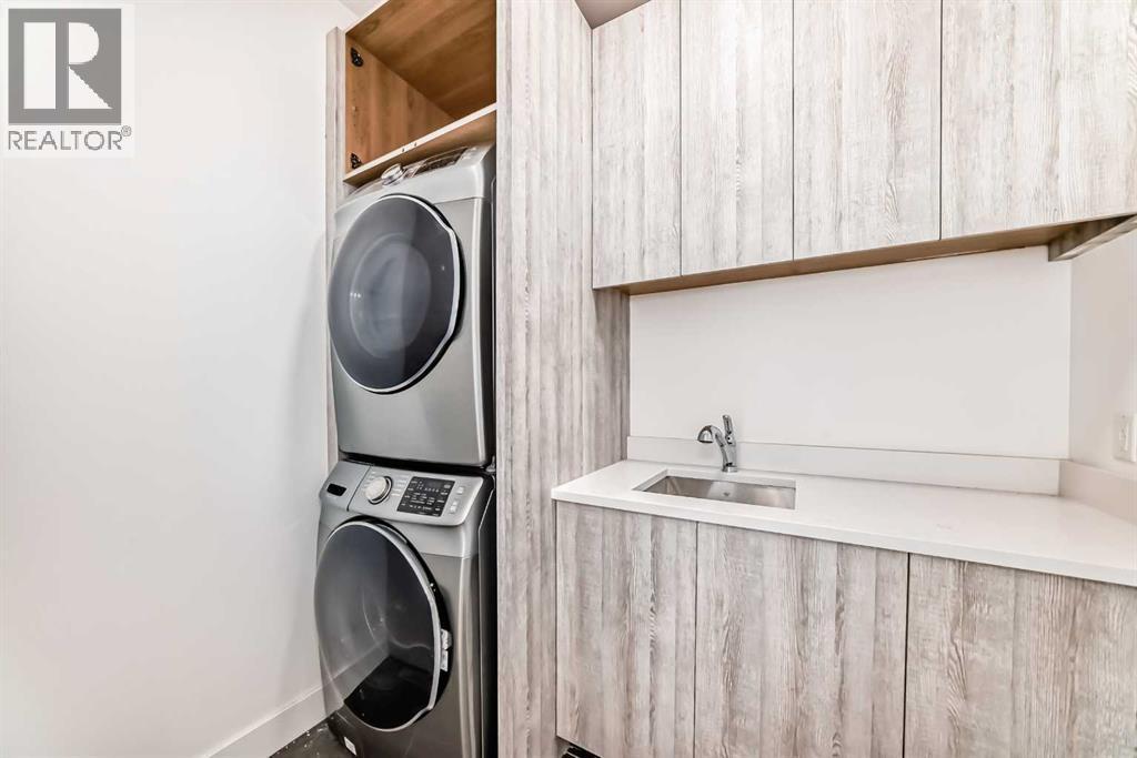 923 36A Street Nw, Calgary, AB - Indoor Photo Showing Laundry Room