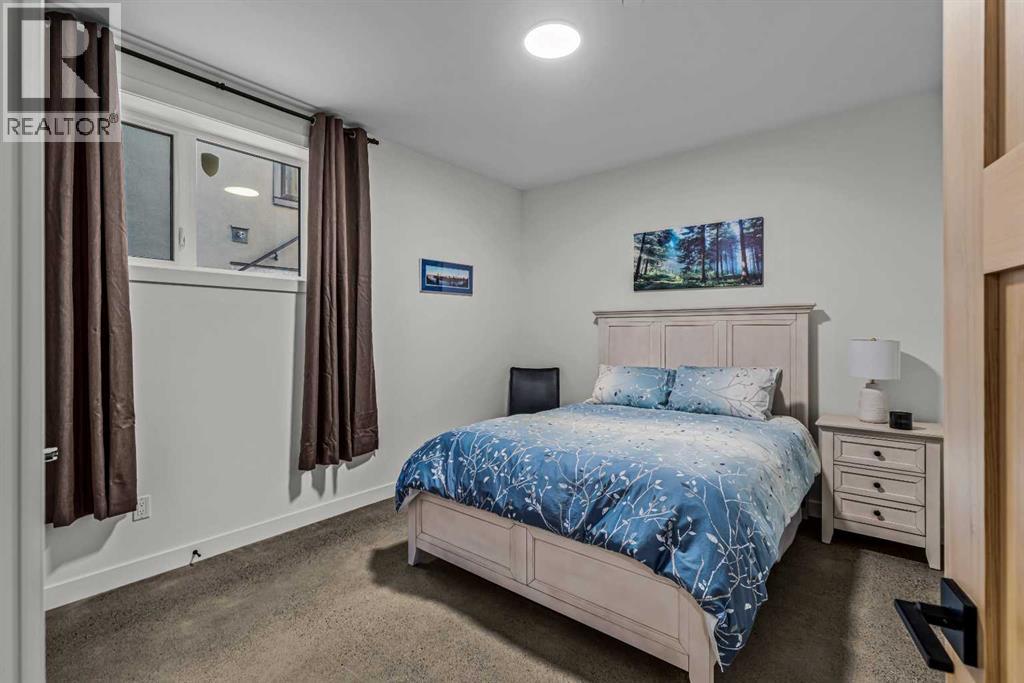 283C Three Sisters Drive, Canmore, AB - Indoor Photo Showing Bedroom