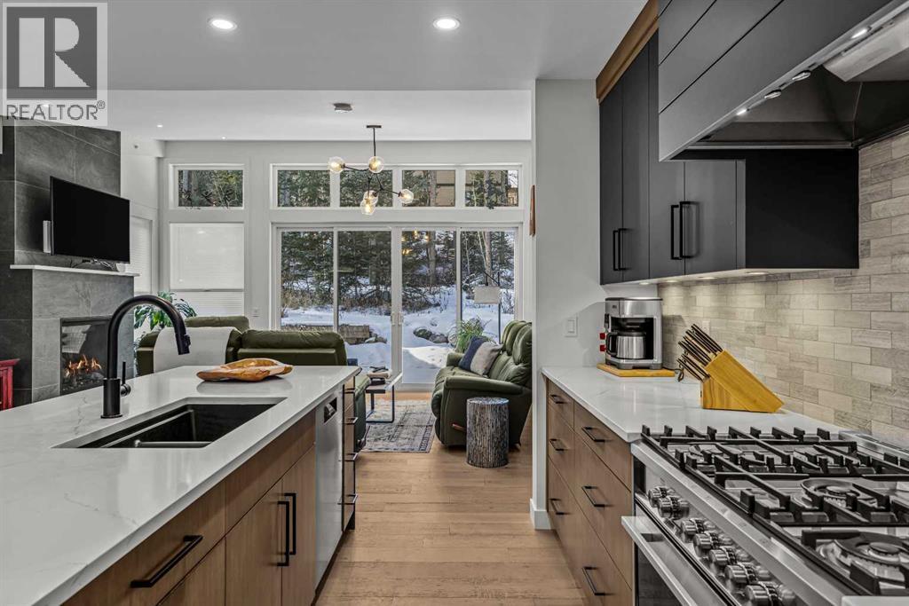 283C Three Sisters Drive, Canmore, AB - Indoor Photo Showing Kitchen With Double Sink With Upgraded Kitchen