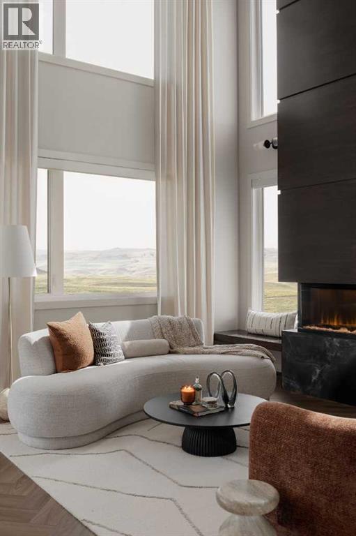 147 Siltstone Place, Balzac, AB - Indoor Photo Showing Bedroom With Fireplace